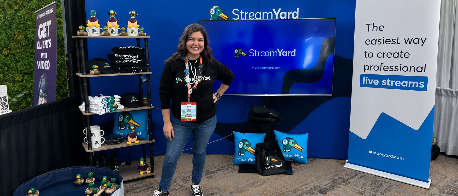 Julie Riley at the StreamYard booth at a creator conference